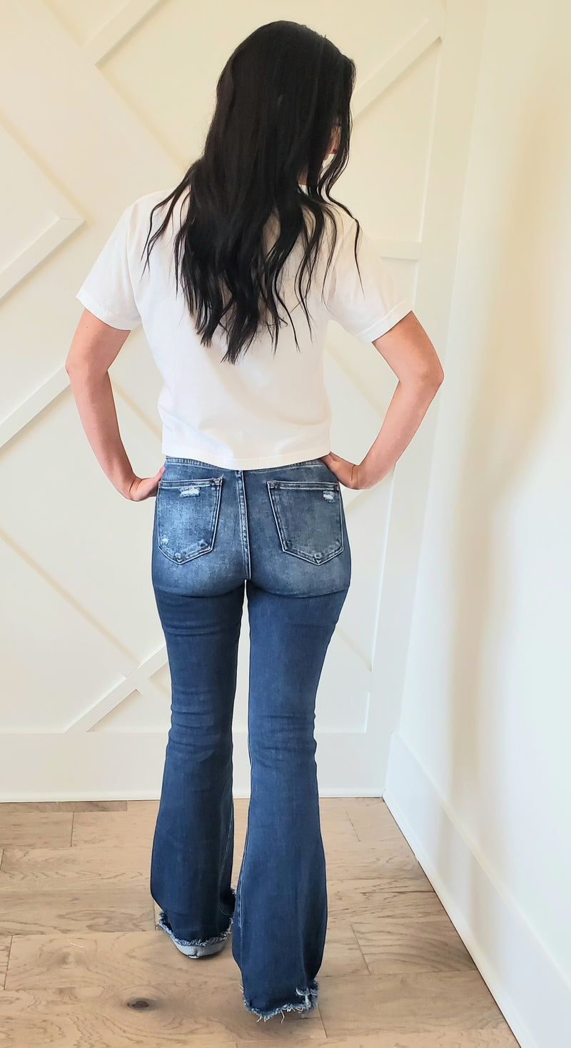Dark High Rise Risen Flare Jeans - On Mays Street